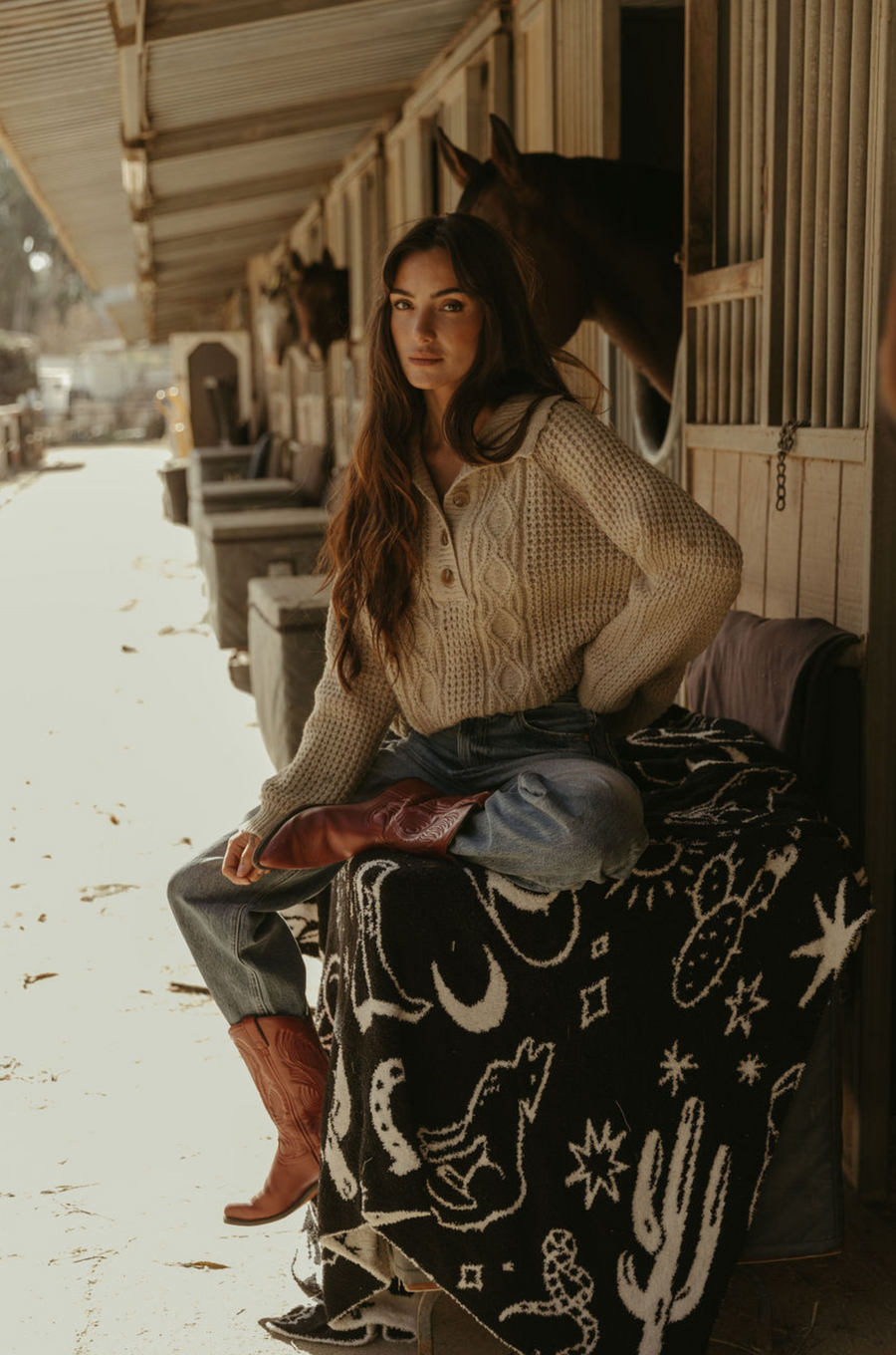 Fuzzy mixed knit crochet sweater. Collar neckline. Front button closures. Long sleeves. Banded hems. Unlined. tan sweater. knit sweater. quarter button up sweater