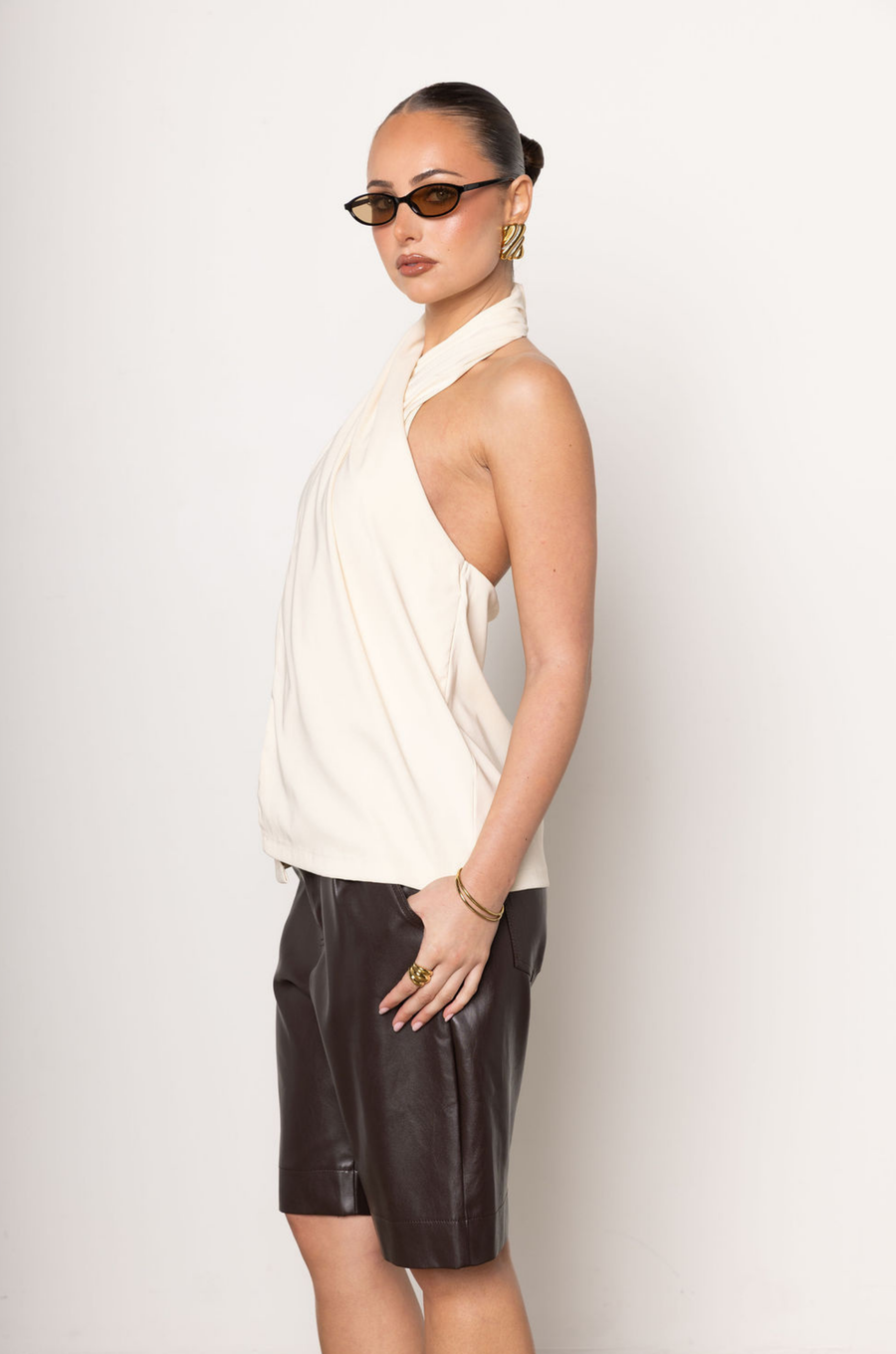 Twisted halter top
Open back
Hook and eye neck closure
Lined
ivory twisted halter top
going out top
halter top
fall top
fall outfit