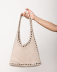 Beige suede tote bag with studded details