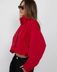 red Funnel neck windbreaker jacket
Track jacket
Button closure
Cinchable waist
2 front pockets
Lined
fall transition outfit