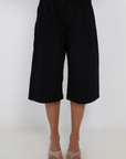 black Long line gaucho shorts
Jorts
Button/fly closure
4 pocket construction
Front pleating detail
Unlined