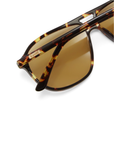 Modern aviator-inspired frame
Featuring a bold flat-top silhouette with geometric shaping
Navigator-inspired angular shaping
Oversized lens profile for full coverage
Polarisation: Category 3
UV Protection: UV400
Double bridge design
Keyhole cut-out detail between bridges
Slim arm design
Lens Height: 5.16cm / Temple Length: 14.5cm / Temple Tip Width: 10.5cm /
Nose Bridge: 1.8cm, Frame Width: 14.4cm