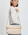 Crossbody faux suede purse
Removable chain strap
Outer zip pocket
Inner zip and slip pocket
Magnetic closure
Lined
Vegan Leather
beige faux seule clutch purse 
fall bag
fall clutch