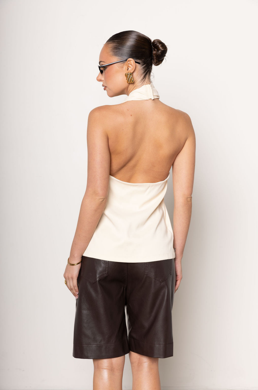 Twisted halter top
Open back
Hook and eye neck closure
Lined
ivory twisted halter top
going out top
halter top
fall top
fall outfit