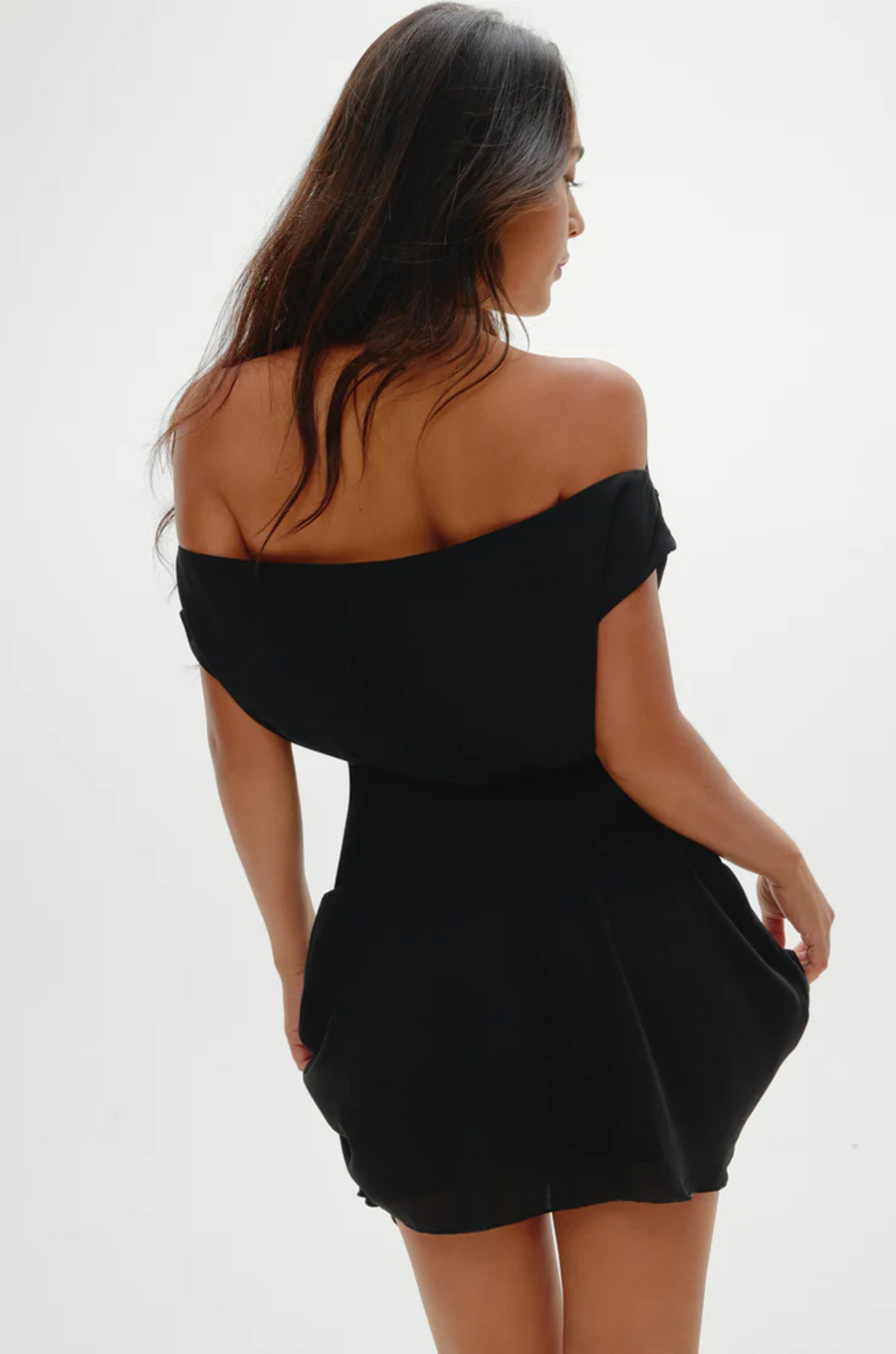 Stretchy knit midsection
Contrasted by lightweight chiffon through the neckline, bodice, and skirt
Wide neckline
Sits naturally as a boat neck and can be styled on or off the shoulders
Double layer skirt
Polyester
black mini dress