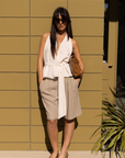 cream ivory Chiffon halter top
Button neck closure
Deep V neckline
Bottom hem opening
Open back
Adjustable back tie
Polyester