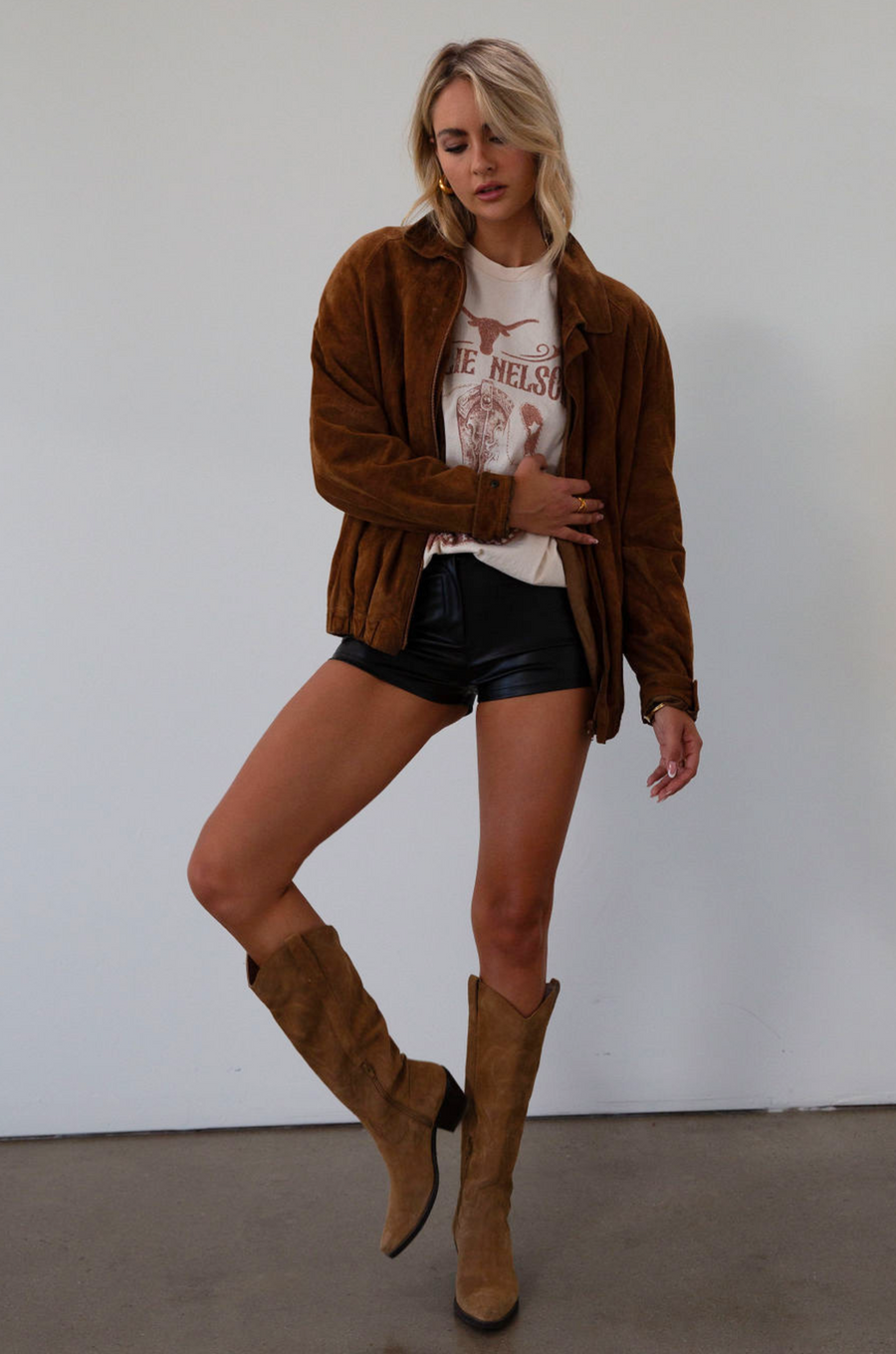 Vegan leather shorts. Hook and eye and zipper fly. No pockets. Unlined. black faux leather shorts. fall shorts. fall outfit. 
