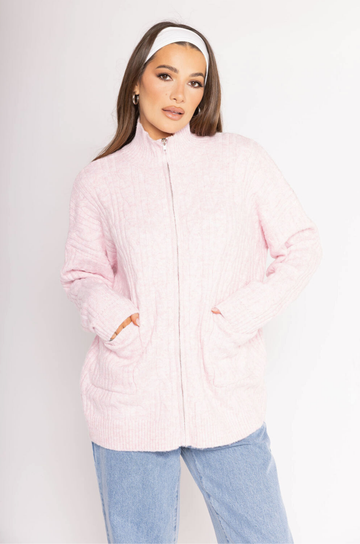 Cable knit sweater
Long sleeve
Front zipper closure
Funnel neck
Front pockets
light pink cable knit zip up sweater
christmas outfit