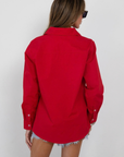 red Button down top
Long sleeve
Collared
Unlined
fall transition top 