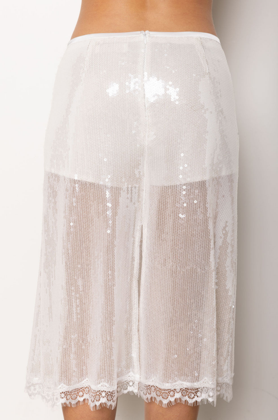 Sequin midi skirt
Lace trim
Back zipper closure
Inner shorts lining
Partially lined/Sheer
white sequin midi skirt
holiday outfit