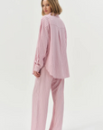 pink Striped button down shirt
Oversized
Center front placket
Classic shirt collar
Shirttail hem
pink oversized button down shirt
For love and lemons