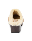 Tan suede clog with wooden sole and silver studs lined with fur