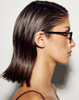 black Sleek, 90s-inspired essential sunglasses. Defined by their slimline rectangle silhouette, this modern style is elevated with gold metal tips on the arms for a refined, polished finish.

Featuring:
slimline rectangle silhouette
90s inspired design aesthetic
gold metal tip detailing on arms
lightweight frame construction
includes branded case and cleaning cloth
designed in Australia
UV protection | UV400