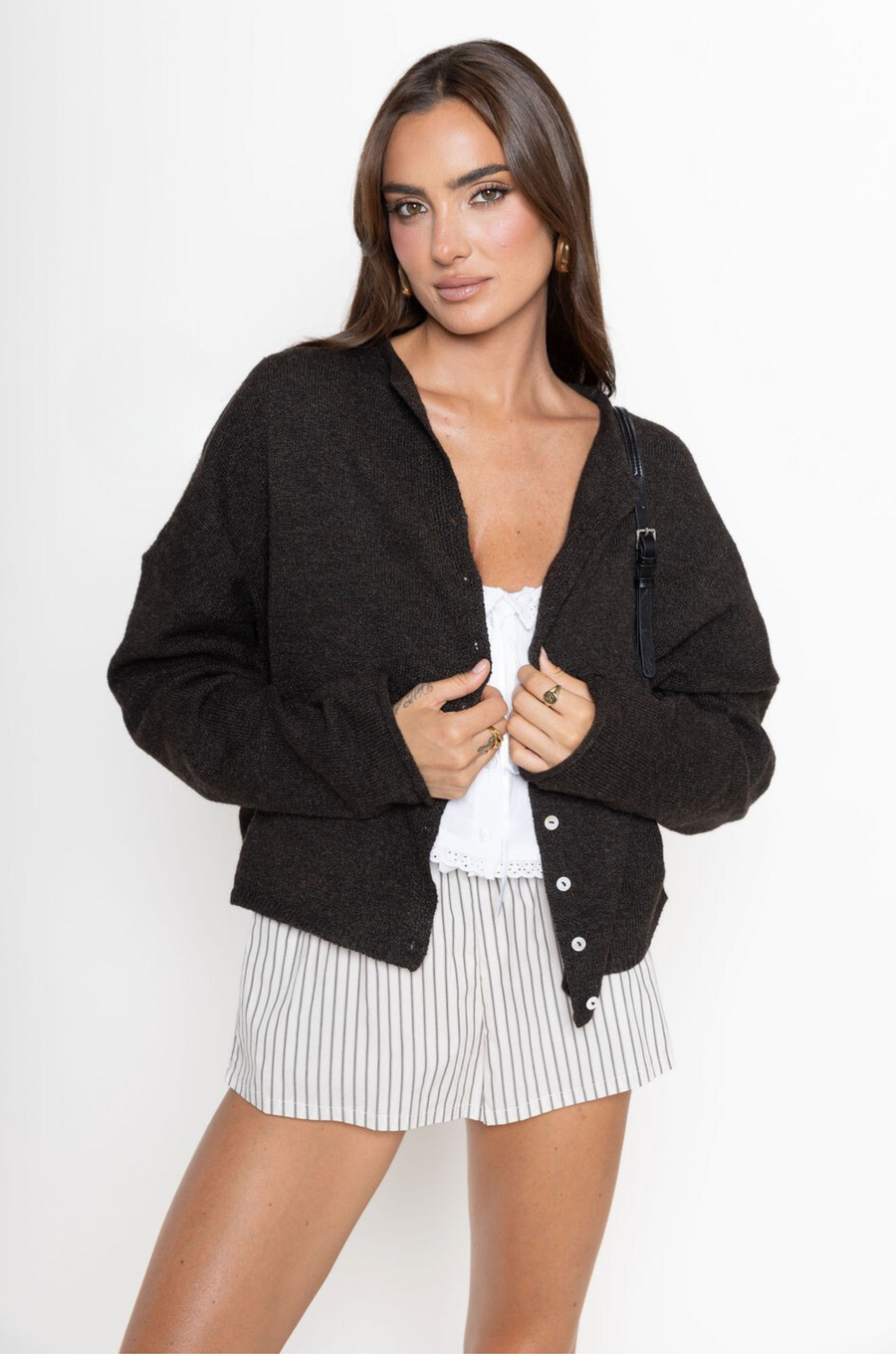 Striped point micro shorts
Lace trim
Elastic waistband
Front bow
Unlined
cream and black striped mini lounge shorts
fall transition outfit