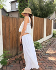 white Cotton eyelet tank top
Cropped
Scallop trim
Unlined/Sheer