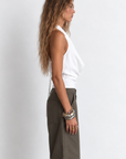 white Chiffon halter top
Cowl neck
Side zipper closure
Adjustable back tie
Unlined/Sheer
