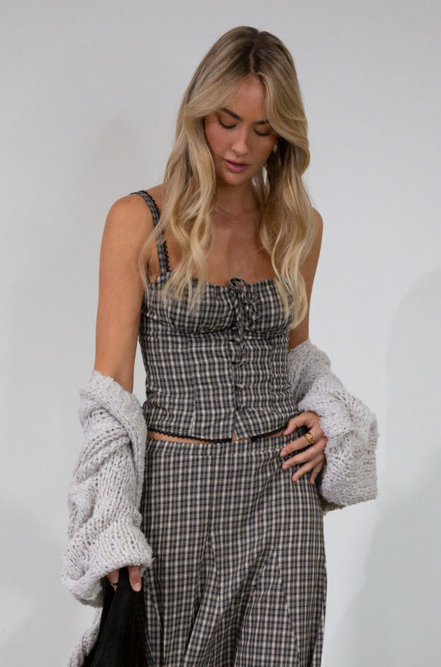 Plaid woven bustier top. Adjustable straps. Drawstring front closure. Front button down closures. Side zipper closure. Elastic smocked back panel. Fully lined. fall top. gingham top. thanksgiving outfit. friendsgiving outfit. fall outfit