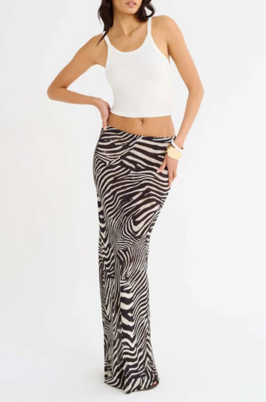 Zebra printed maxi skirt
Elastic waistband
Bias cut
Unlined/Sheer