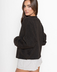 Fuzzy knit cardigan
Crewneck
Front button down closures
Long sleeves
Unlined
chocolate brown cardigan
fall cardigan
fall outfit
fall transition outfit