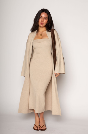 Ribbed knit longline cardigan. Open front. Long sleeves. Unlined. Ribbed knit maxi dress. Strapless elastic folded neckline. Back slit. Unlined. tan dress cardigan set