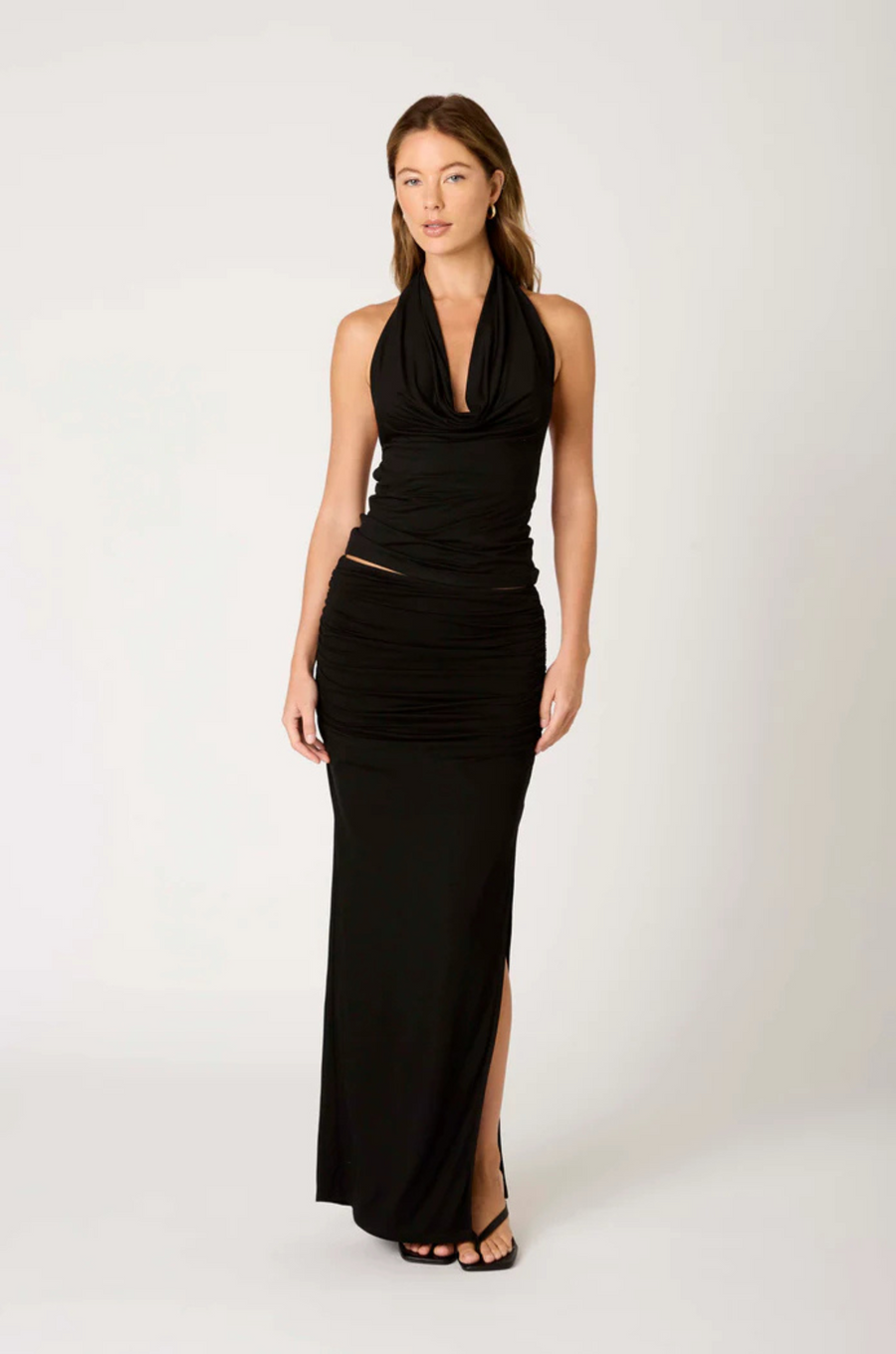 Halter neck top
Draped cowl neckline
Ultra soft jersey knit
Open back with slim adjustable strap
black halter neck top
black cowl neck top