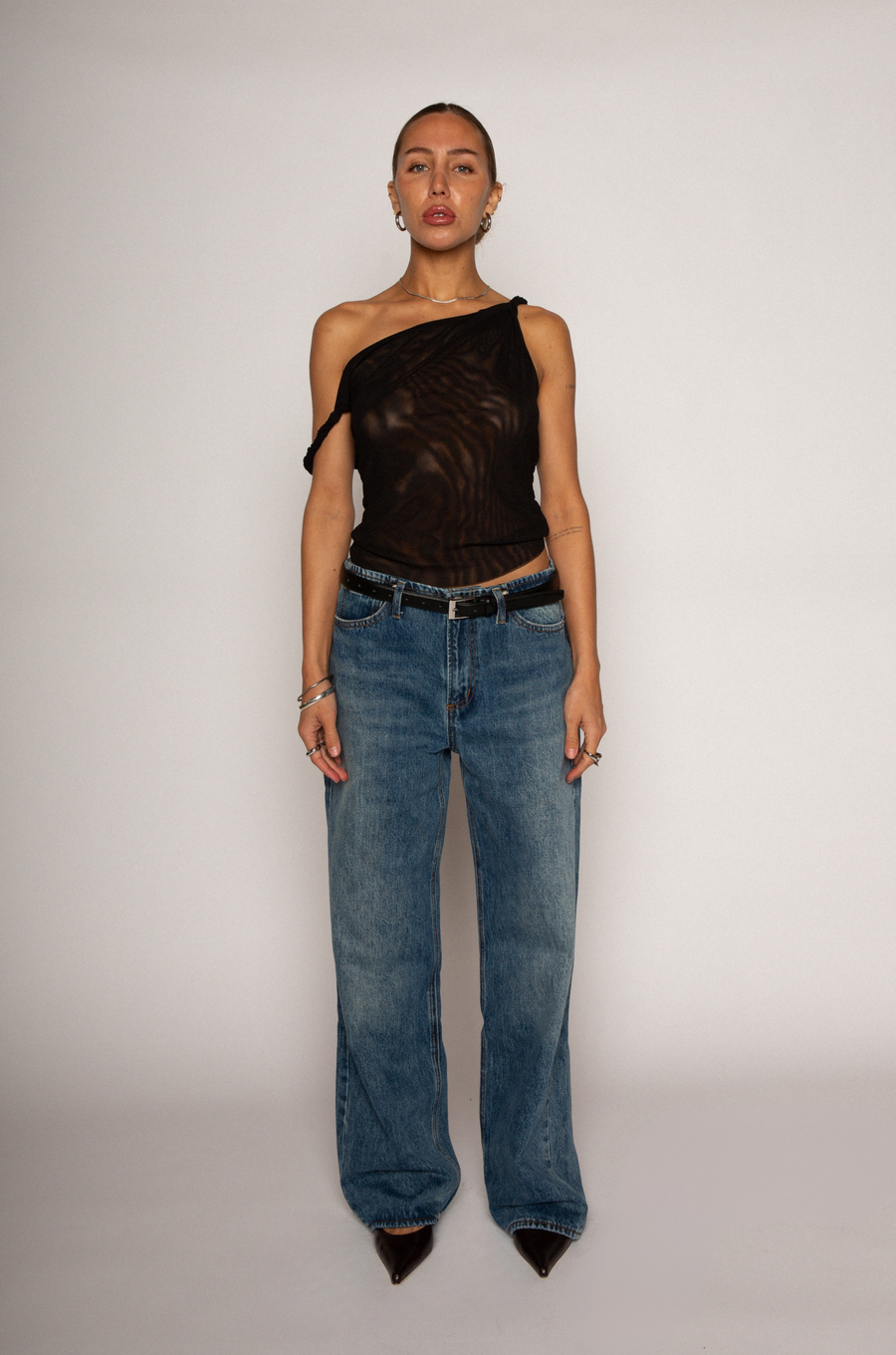 Knit mesh crop top. Twisted fixed straps. Raw edge hem. Fully lined/sheer. black sheer top. black tank top. going out top