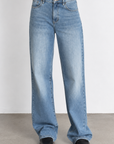 Designed with a mid-rise waist that sits just below your belly button
Relaxed fit through the butt, thighs, and legs for comfort, with a wide straight leg that bunches at the ankle for the ultimate Y2K look
Measurements for size 26
Rise: 11"
Inner Leg Length: 32"
Hem: 20"
Cotton/Recycled Cotton