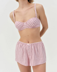 pink Striped boxer shorts
Front boxer placket with buttons
Adorned with picot trims
Decorative bow at front waist
Unlined
Polyester/Cotton
for love & lemons boxer shorts