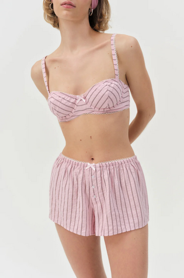 pink Striped boxer shorts
Front boxer placket with buttons
Adorned with picot trims
Decorative bow at front waist
Unlined
Polyester/Cotton
for love & lemons boxer shorts