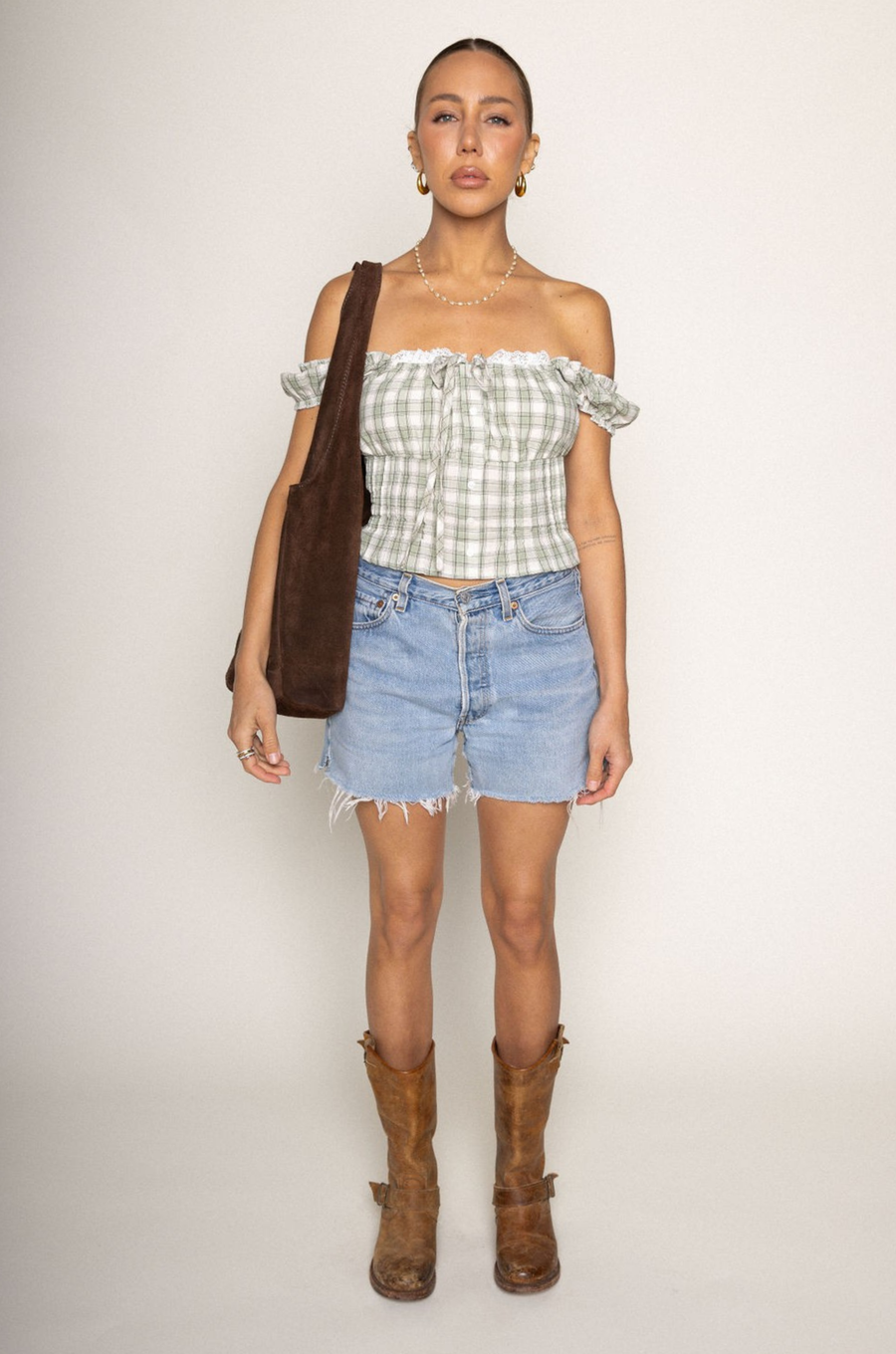 green Woven plaid top
Faux front button
Adjustable front tie
Lace bust trim detail
Smocked shoulder sleeves and back
Side zipper
Unlined
summer top
spring top