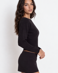 black Knit low rise mini skirt
Inner short lining
Elastic waistband