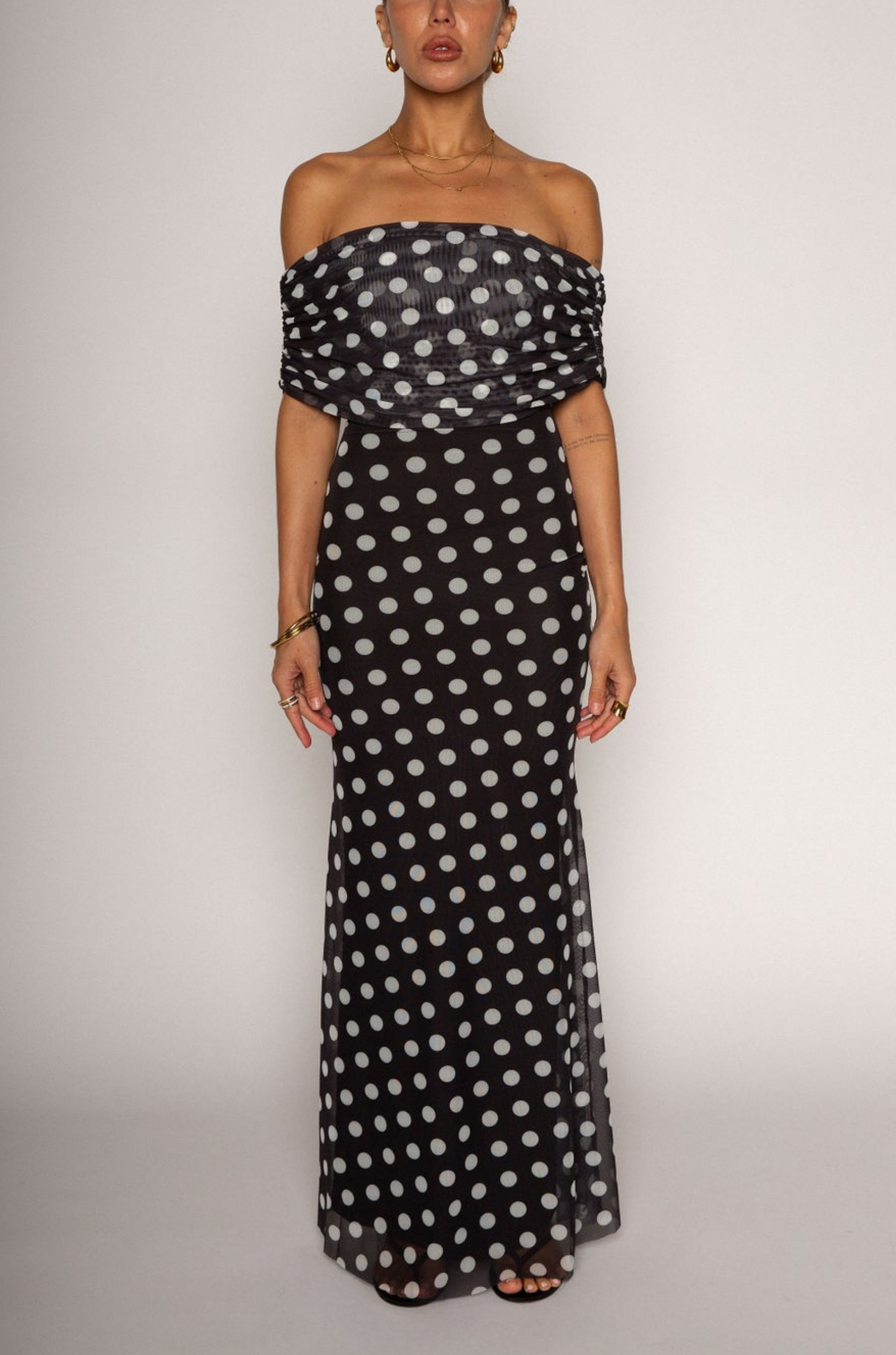 Polka dot printed knit mesh maxi dress. Off the shoulder sleeves. Raw hem. Fully lined. Polka dot off the shoulder maxi dress. summer dress. spring dress
