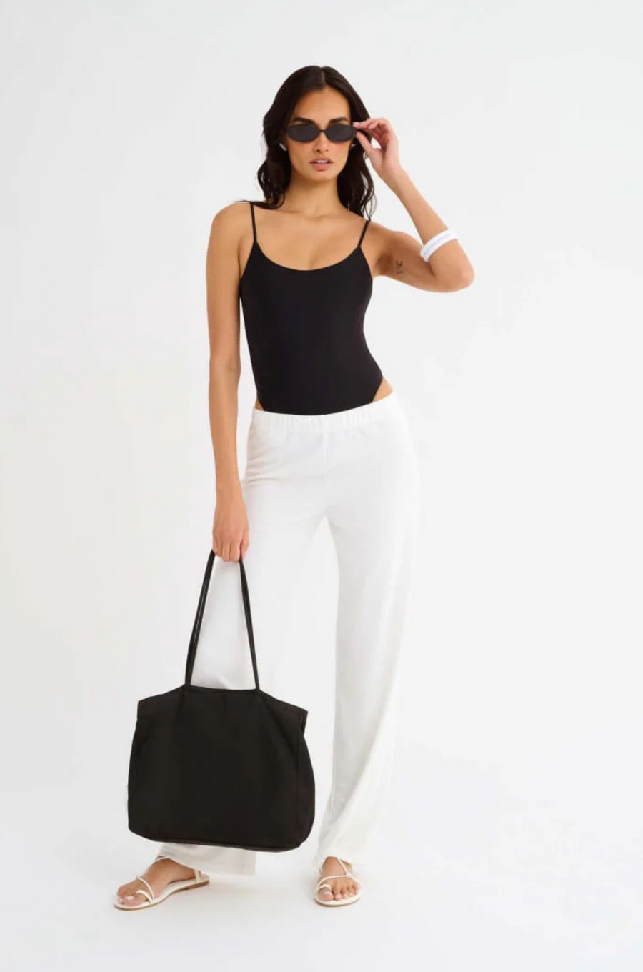 black One piece swimsuit
Scoop neck
Open back
High cut