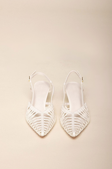 Low kicked-in stiletto heel
Closed pointed toe
Strappy detailing on vamp
Sling back ankle strap with adjustable buckle
Exposed heel counter
Heel height: 6cm
Synthetic upper
white scrappy heel
bridal heels