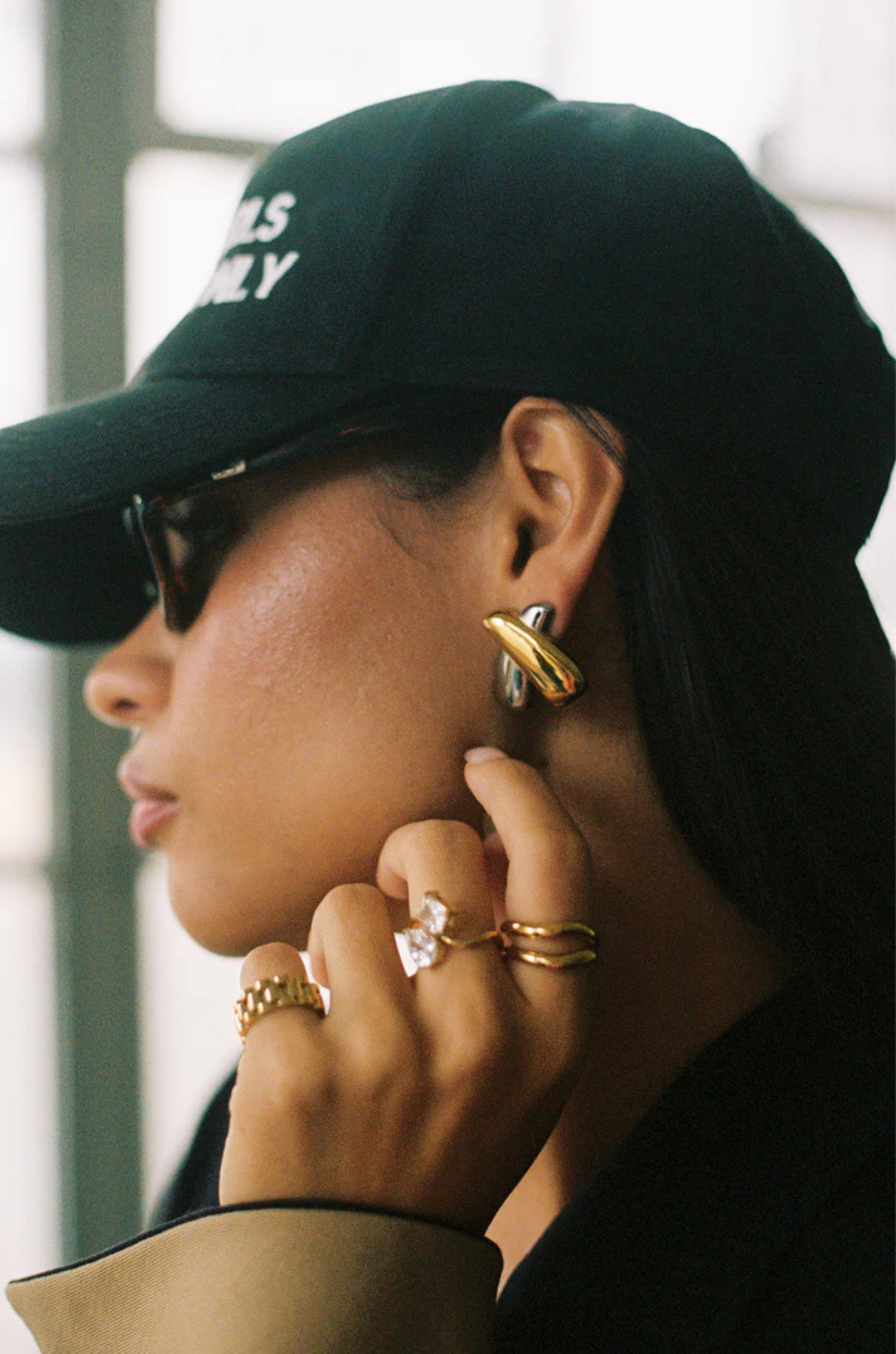 Two toned crossover "X" shaped earrings. Tarnish free. Stainless steel. Lightweight.