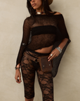 black Lace capri pants
Elastic waistband
Unlined/Sheer