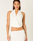 white Light and flowy with a cropped halter top
Deep V-neckline
Relaxed, draped fit
Overlapping wrap front
Polyester
bridal top