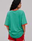 Game on. Keep your eye on the ball in this OS Ringer Tee designed in colors inspired by the Team Mexico jersey.
Featuring an athletic influence with rib contrast along the neckline and arms.
Oversized fit and length, accented with dropped shoulders
Available in just one size
Length: 27.5"
Cotton
green mexico world cup jersey tee