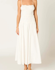white Smocked maxi dress
Straight neckline
Adjustable spaghetti straps
Gathered bust with tiered smocking
Back cutout detail
Side pockets
Fully lined