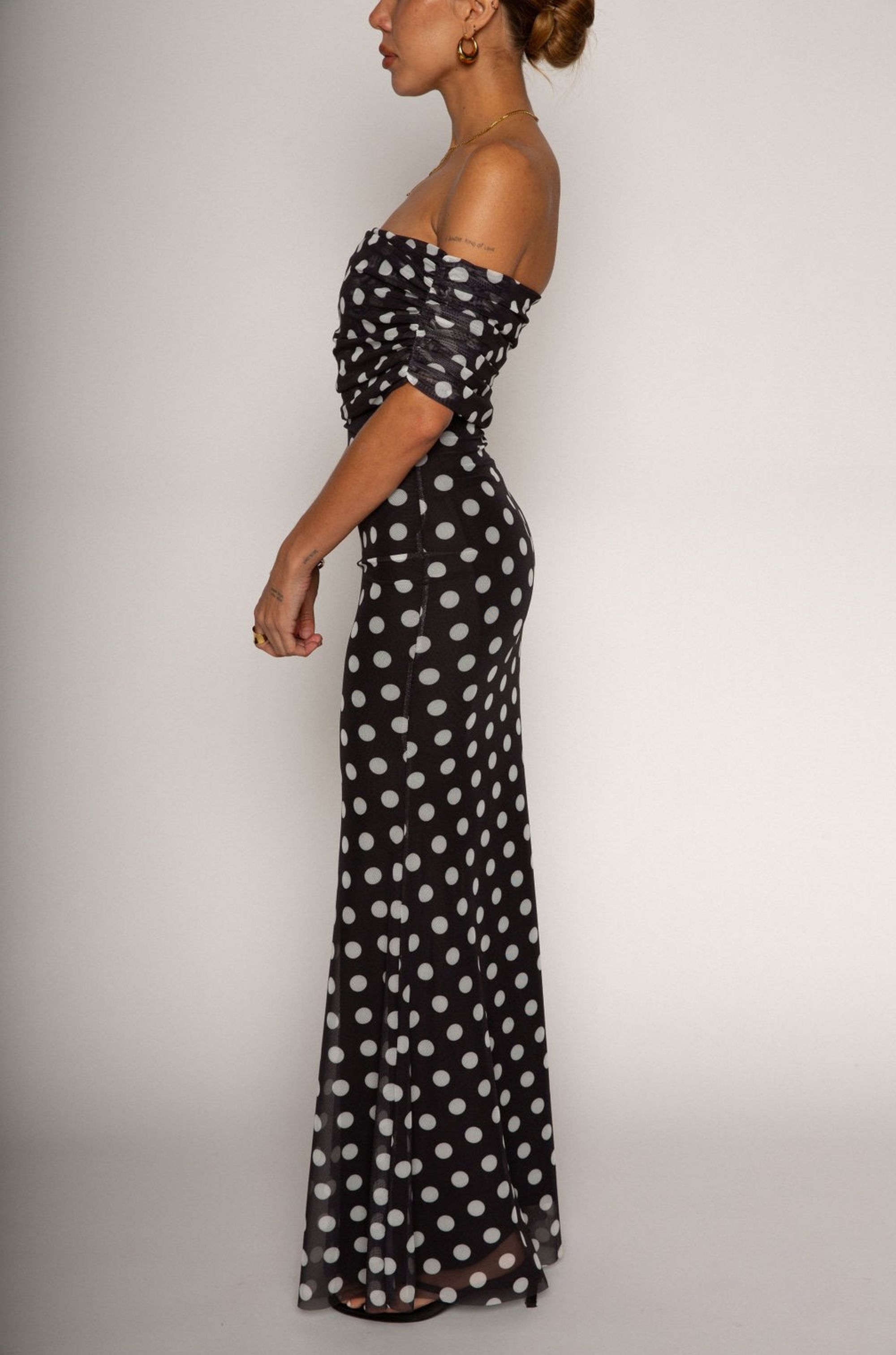 Polka dot printed knit mesh maxi dress. Off the shoulder sleeves. Raw hem. Fully lined. Polka dot off the shoulder maxi dress. summer dress. spring dress