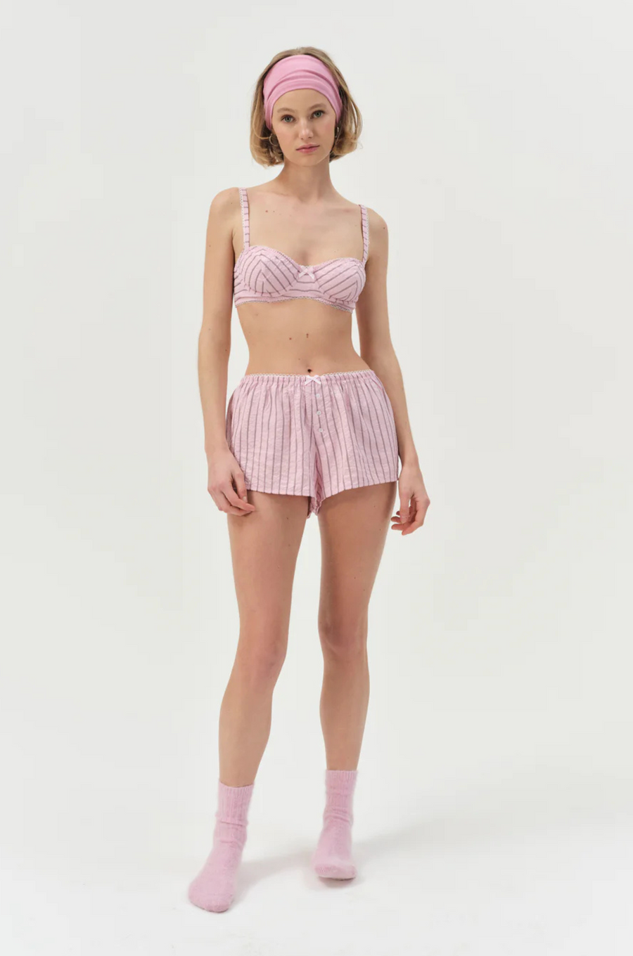 pink Striped boxer shorts
Front boxer placket with buttons
Adorned with picot trims
Decorative bow at front waist
Unlined
Polyester/Cotton
for love & lemons boxer shorts