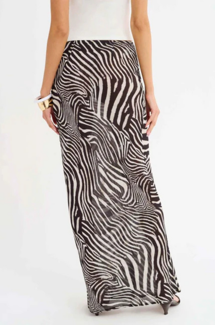 Zebra printed maxi skirt
Elastic waistband
Bias cut
Unlined/Sheer