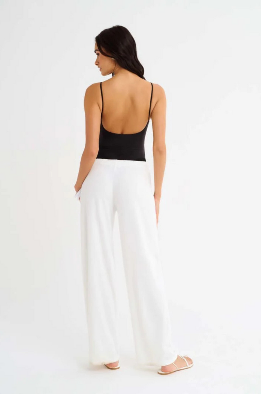 black One piece swimsuit
Scoop neck
Open back
High cut