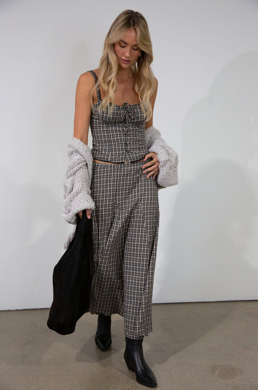 Plaid woven bustier top. Adjustable straps. Drawstring front closure. Front button down closures. Side zipper closure. Elastic smocked back panel. Fully lined. fall top. gingham top. thanksgiving outfit. friendsgiving outfit. fall outfit