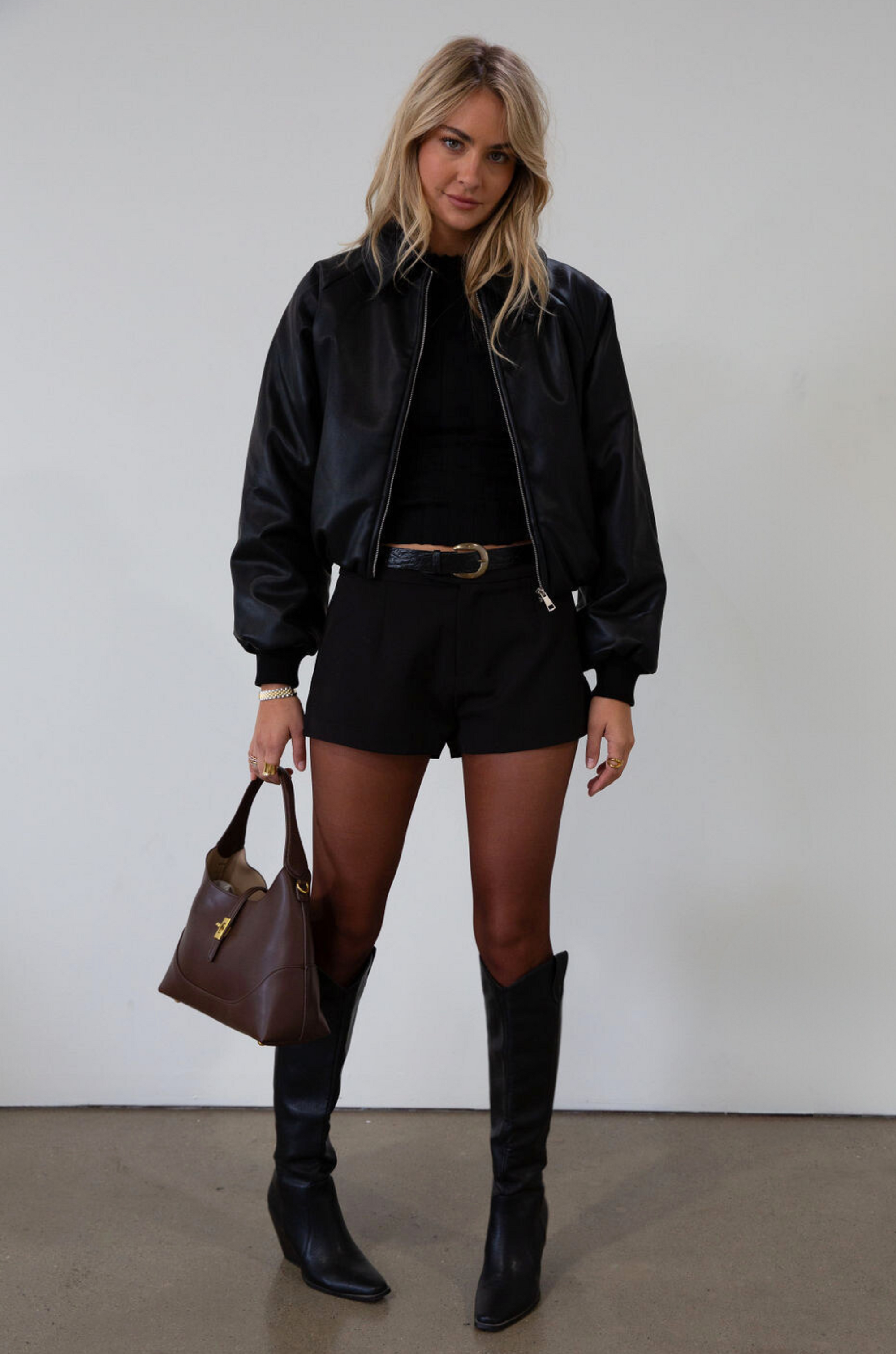 Knit top. Mock neck. Long sleeves. Lettuce edge hems. Unlined. black long sleeve. black ribbed long sleeve. fall top. fall outfit. 