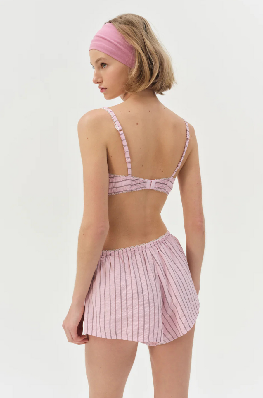 pink Striped boxer shorts
Front boxer placket with buttons
Adorned with picot trims
Decorative bow at front waist
Unlined
Polyester/Cotton
for love & lemons boxer shorts