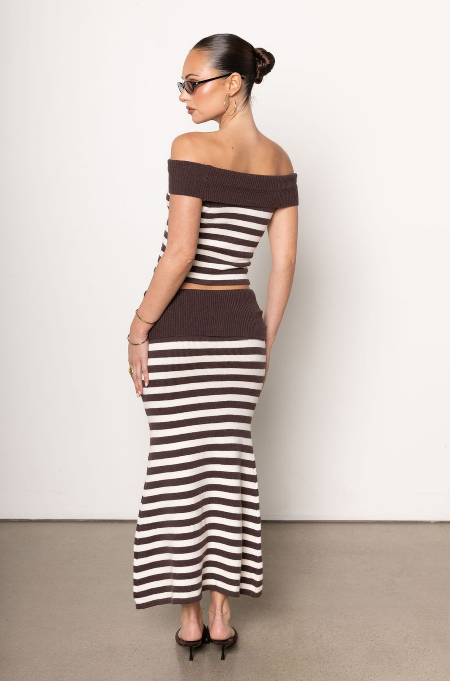striped set
Brown and white striped maxi skirt
brown and white skirt set
fall set
fall outfit
Striped knit top
Off the shoulder fold over
Sleeveless
Unlined
Length: 24"
Viscose/Nylon/Polyester
Striped knit A line maxi skirt
Fold over waistband
Unlined
Length: 32"
Viscose/Nylon/Polyester