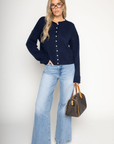Knit long sleeve cardigan
Rolled collar
Button down closure
navy blue cardigan
fall cardigan
fall outfit
fall sweater