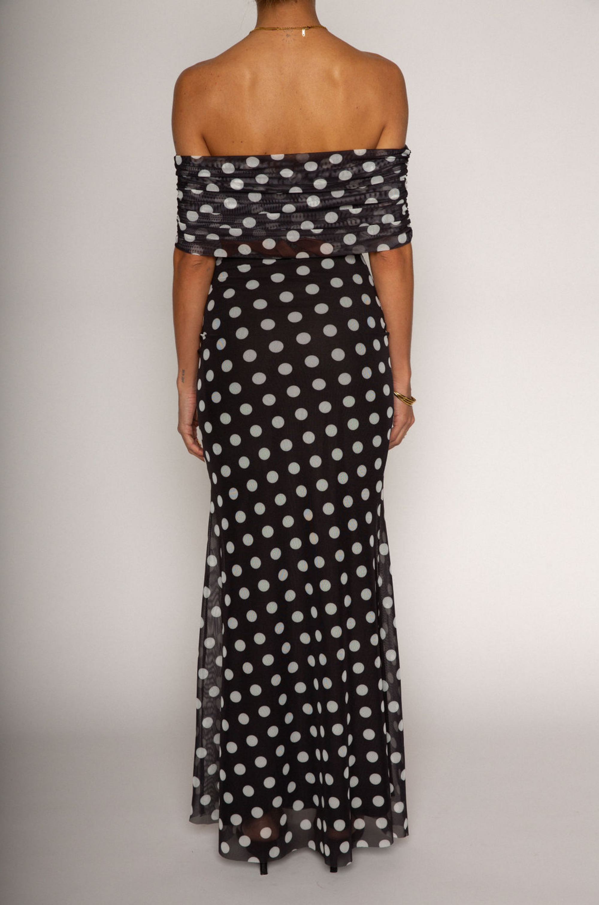 Polka dot printed knit mesh maxi dress. Off the shoulder sleeves. Raw hem. Fully lined. Polka dot off the shoulder maxi dress. summer dress. spring dress
