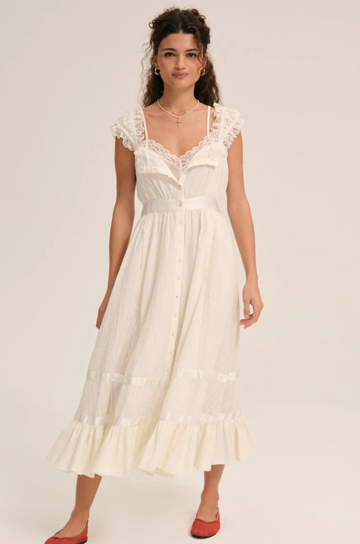 Cotton midi dress
Includes a romper liner
Center-front button closure
Lace trims
Satin ribbon details
white ivory summer mini dress
countryside midi dress
bridal midi dress